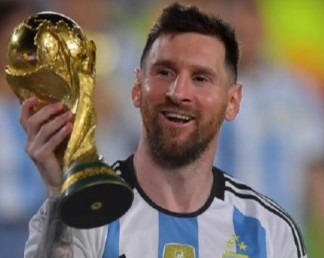 Lionel Messi with World Cup trophy
